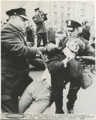 Item #5535 [Press photo] Nixon inauguration protester assaulted by police