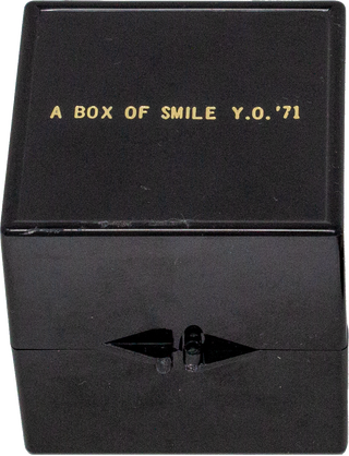Item #6649 A Box of Smile Y.O ’71 [Black with Facsimile Mirror]. George Maciunas Yoko Ono